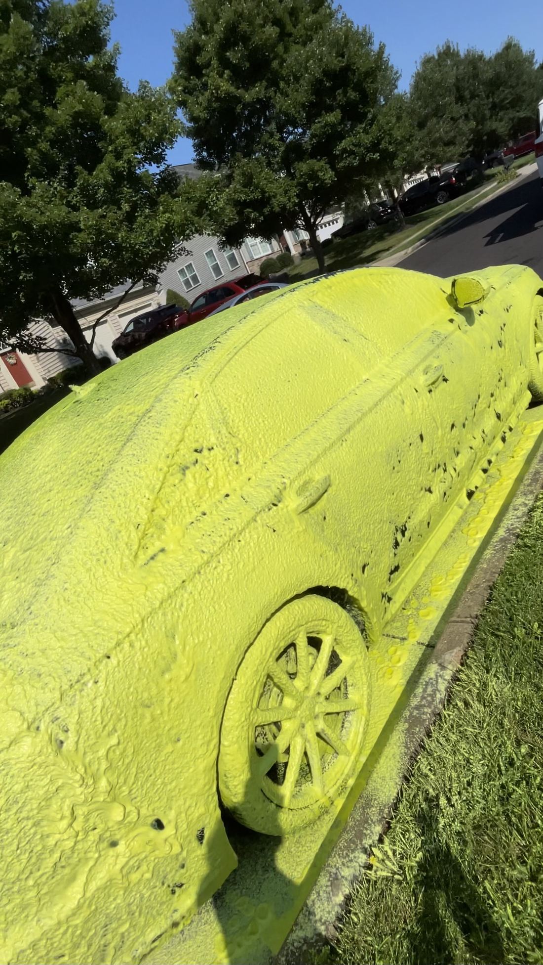 Thick foam soap covering a vehicle during the hand wash stage of a full detail.