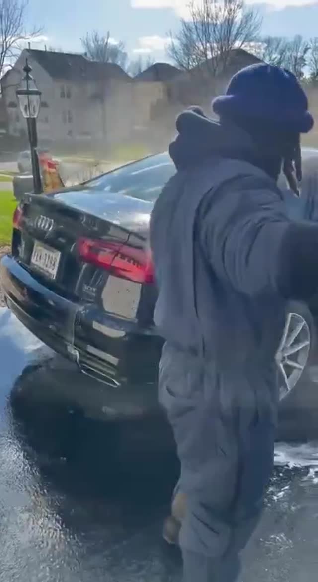 Foam wash and rinse on an Audi sedan in a Northern Virginia driveway.