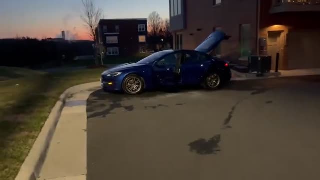 A full detail on a sedan, wrapped up as evening sets in.